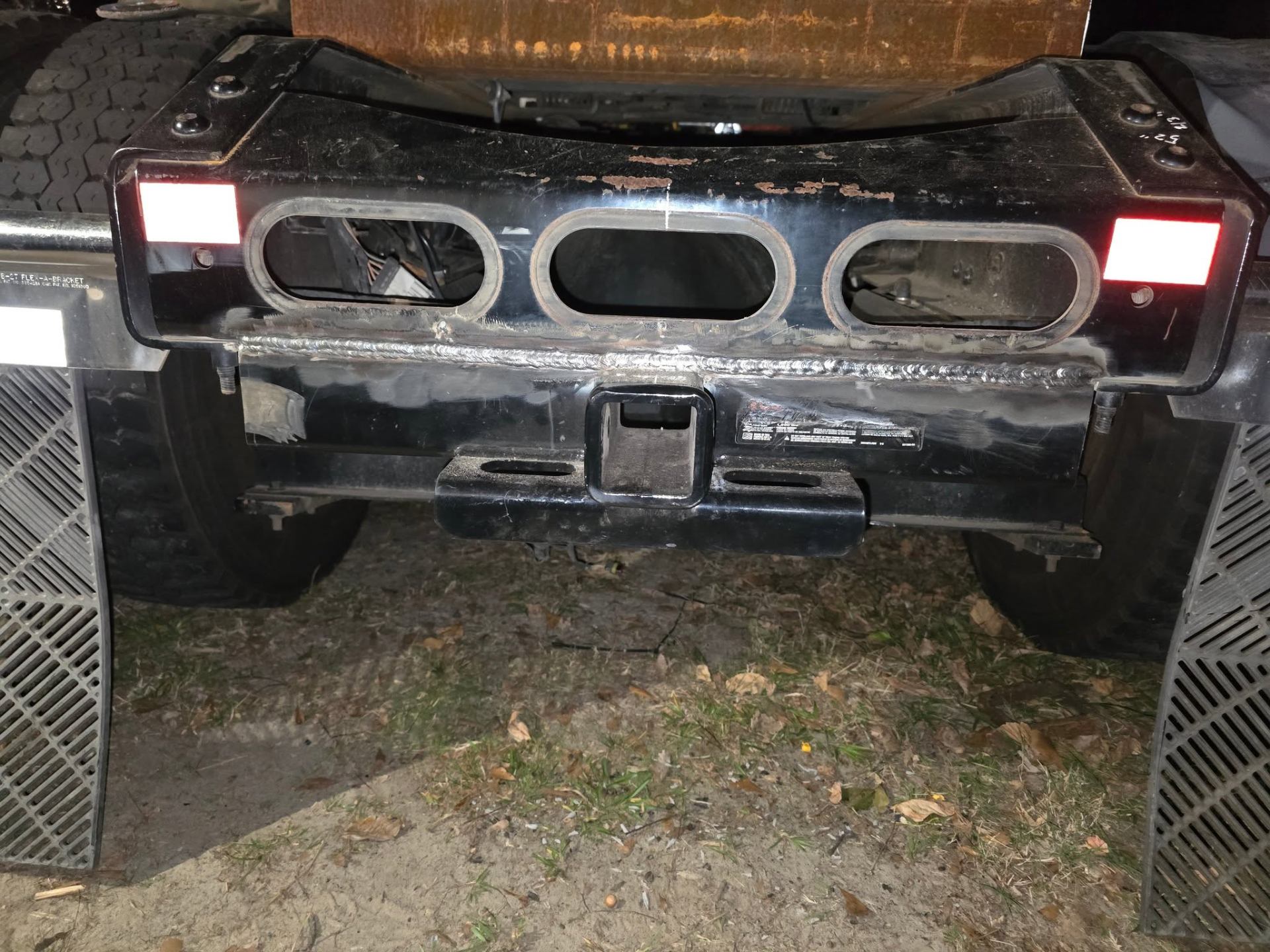 Custom welded truck rear bumper with light cutouts and hitch receiver