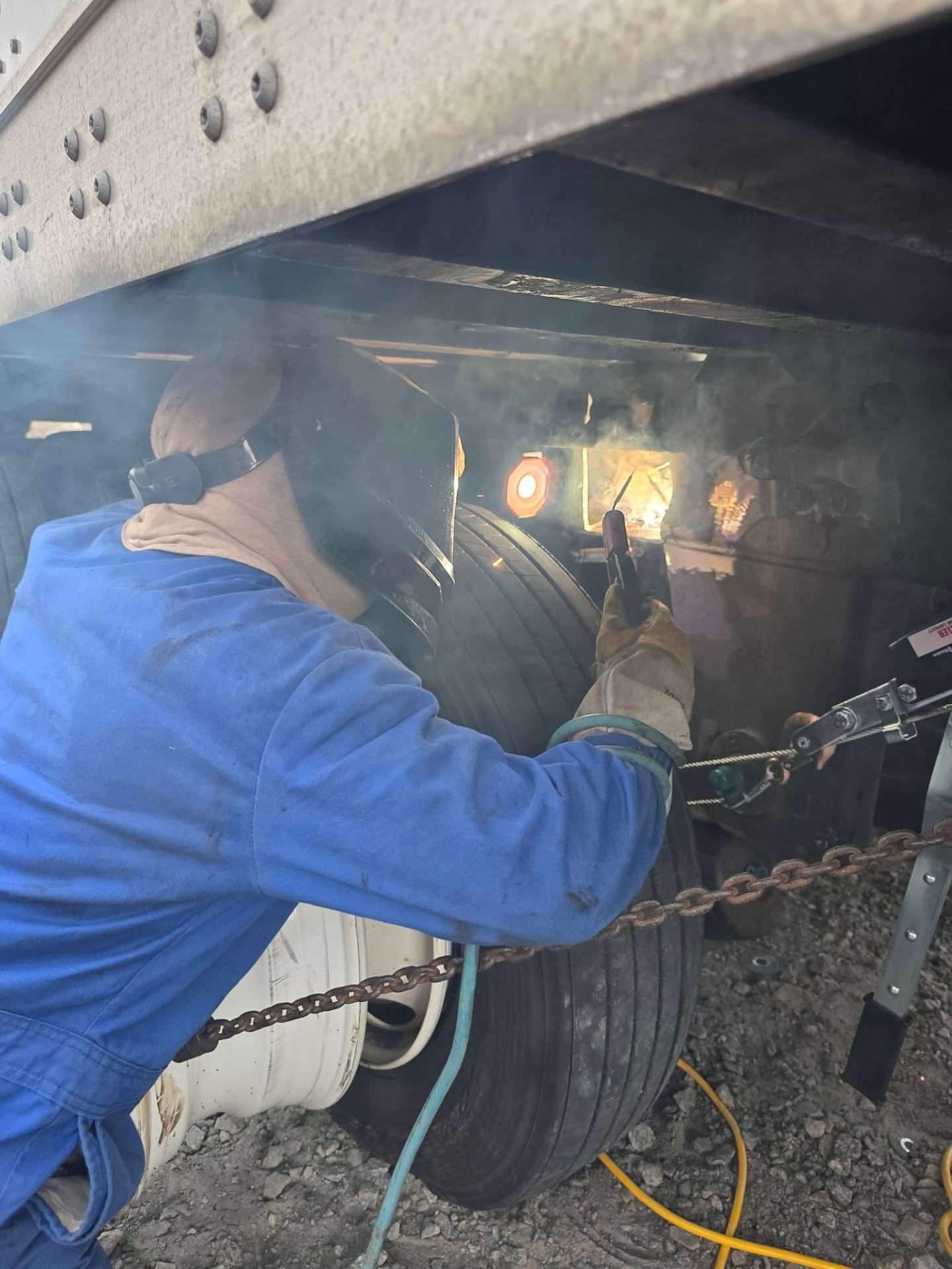 Mobile welder repairing trailer axle on-site in Franklin, VA